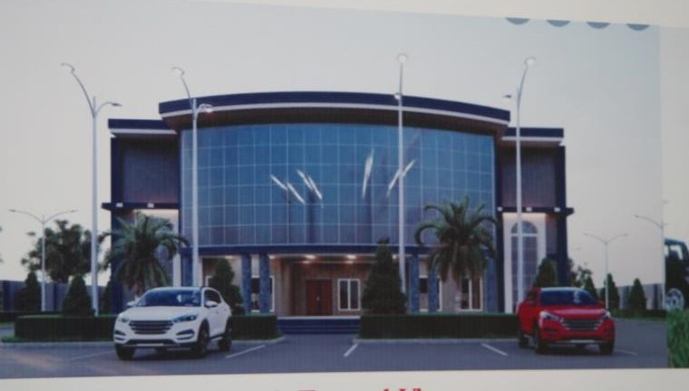 Architectural rendering of the future Halleluyah Church sanctuary — a modern multi-story building with a curved glass facade