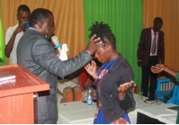 Prayer ministry — laying on of hands